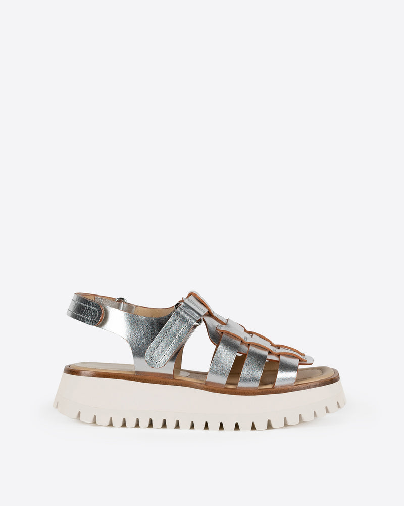 Metallic silver sandal with a white chunky sole on a white background