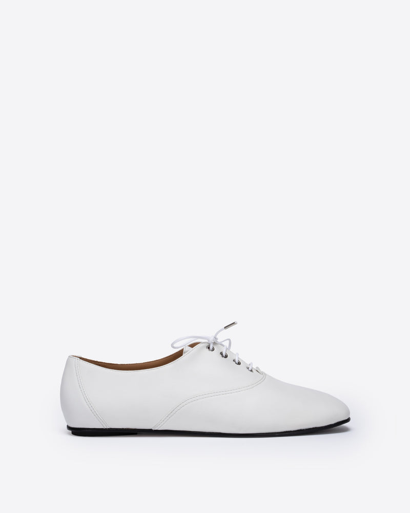 White leather shoe on a white background